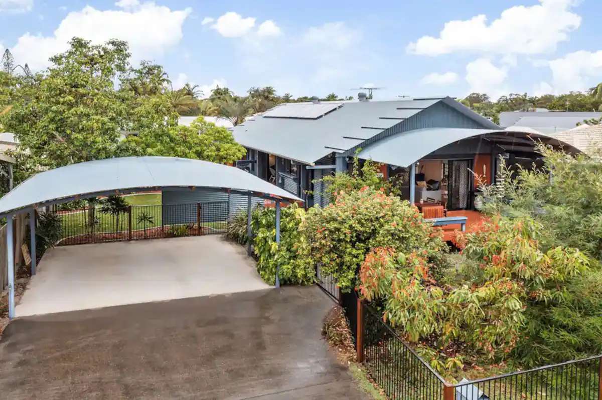 Capricorn Dancer’s blue-grey curved roofs surrounded by established trees